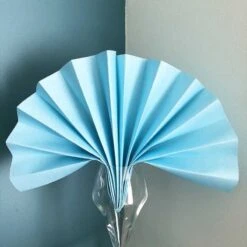 25 Serviettes Non-tissées Bleu Ciel Premium 40 Cm Table'Colors -Vacances Vaisselle Magasin 25 serviettes non tisse luxe bleu ciel 40 x 40cm 3